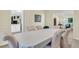 Bright dining room with table and seating, connecting to other living spaces in the home at 3 Birmingham Ct, Charleston, SC 29407