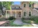 Charming brick home with a landscaped front yard, a covered porch, and curb appeal at 3 Birmingham Ct, Charleston, SC 29407