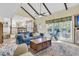 Open concept living area with vaulted ceilings, large windows, and access to the kitchen at 3 Birmingham Ct, Charleston, SC 29407