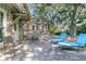 Back patio with furniture, open space, and an attached screened in porch, perfect for outdoor lounging and dining at 3 Birmingham Ct, Charleston, SC 29407