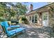 Spacious patio featuring lounge chairs and a grill for outdoor relaxation and entertainment, with mature trees providing shade at 3 Birmingham Ct, Charleston, SC 29407