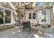 Outdoor patio with ceiling fan and outdoor dining set at 3 Birmingham Ct, Charleston, SC 29407