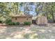 Well-maintained sheds in a lush, green backyard, offering ample storage space at 3 Birmingham Ct, Charleston, SC 29407