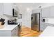 Well-lit kitchen featuring stainless steel appliances, bright countertops, and ample cabinet space at 3009 Palm Blvd, Isle of Palms, SC 29451