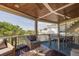 Relaxing screened porch features comfortable seating and a dining table, perfect for enjoying outdoor living at 3009 Palm Blvd, Isle of Palms, SC 29451