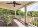 Charming porch with wicker chairs and peaceful surroundings, perfect for relaxing and enjoying the fresh air at 3009 Palm Blvd, Isle of Palms, SC 29451