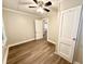 Comfortable bedroom with wood-look floors and large closet at 307 Mill St, Walterboro, SC 29488