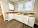 Updated kitchen featuring butcher block countertops, and ample storage space at 307 Mill St, Walterboro, SC 29488