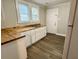 Well-organized kitchen featuring butcher block countertops and stainless steel sink at 307 Mill St, Walterboro, SC 29488