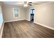 Light-filled living room with wood-look floors and neutral paint ready for furnishings at 307 Mill St, Walterboro, SC 29488