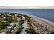 Aerial view showing houses along the shore at 3128 Palmetto Blvd, Edisto Island, SC 29438