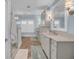 Bright and airy bathroom with double vanity, walk-in shower, and neutral color palette at 3128 Palmetto Blvd, Edisto Island, SC 29438