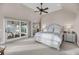Bright and airy main bedroom with balcony, offering private outdoor access with great natural light and coastal feel at 3128 Palmetto Blvd, Edisto Island, SC 29438