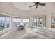A spacious main bedroom with ocean views, and private balcony access, offering a relaxing and luxurious atmosphere at 3128 Palmetto Blvd, Edisto Island, SC 29438
