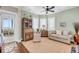 Cozy home office with natural light, comfortable seating, and ocean views at 3128 Palmetto Blvd, Edisto Island, SC 29438