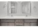 Bathroom featuring double sinks with modern fixtures and granite countertops at 321 Abercom Place Dr, Moncks Corner, SC 29461