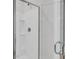 Modern tiled shower with glass door and shelving at 321 Abercom Place Dr, Moncks Corner, SC 29461