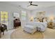 Bright bedroom with neutral tones, ceiling fan, and a decorative rug at 3381 Stockdale St, Mount Pleasant, SC 29466