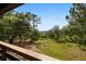 Expansive backyard view featuring lush trees and pristine landscape, offering a serene outdoor space at 3399 Freeman Hill Rd, Johns Island, SC 29455