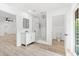 Well-lit bathroom with a glass-enclosed shower, modern sink, and separate toilet area at 3399 Freeman Hill Rd, Johns Island, SC 29455
