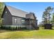Inviting single-Gathering home with a charming front porch and well-manicured landscaping at 3399 Freeman Hill Rd, Johns Island, SC 29455