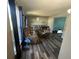 Inviting living room with modern plank floors and comfortable seating, ready for relaxation at 3801 Battleview Ct, North Charleston, SC 29420