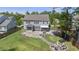 Aerial view of the backyard featuring a patio, play area, fire pit, and ample lawn space at 4019 Cascades Thrust, Summerville, SC 29483