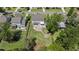 Aerial view of the backyard with patio, fire pit, and landscaped walking path at 4019 Cascades Thrust, Summerville, SC 29483