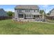 Spacious backyard with a patio, lounge chairs, and an outdoor dining area at 4019 Cascades Thrust, Summerville, SC 29483