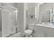 Bright and modern bathroom with a glass-enclosed shower, vanity with sink and a mirrored wall cabinet at 4019 Cascades Thrust, Summerville, SC 29483