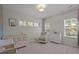 Serene Bedroom featuring a crib, chair, natural light, and calming decor creating a peaceful environment for baby at 4019 Cascades Thrust, Summerville, SC 29483