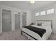 Bedroom featuring carpet flooring, a queen sized bed, 3 closets, and natural lighting coming in through 3 windows at 4019 Cascades Thrust, Summerville, SC 29483