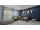 Stylish bonus room with a comfortable sectional, a playful decor and plenty of space for Gathering fun at 4019 Cascades Thrust, Summerville, SC 29483