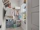 Efficiently organized closet with shelves, hanging rods, and storage bins maximizing space and accessibility at 4019 Cascades Thrust, Summerville, SC 29483