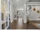 Open foyer with hardwood floors and view of the staircase and living areas at 4019 Cascades Thrust, Summerville, SC 29483
