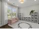 Bright playroom with alphabet rug, perfect for learning and play at 4019 Cascades Thrust, Summerville, SC 29483