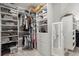 Organized walk-in closet with custom shelves, drawers, and ample storage space for clothes and accessories at 4019 Cascades Thrust, Summerville, SC 29483
