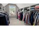 A large walk-in closet includes shelving and hanging storage at 4019 Cascades Thrust, Summerville, SC 29483