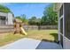 Well-maintained backyard featuring a playset and ample green space at 402 Bay Creek Dr, Charleston, SC 29414