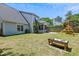 Large backyard features a playground, sand table, and ample green space at 402 Bay Creek Dr, Charleston, SC 29414