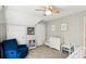 Bedroom with crib, armchair, changing table, and storage for an organized space at 402 Bay Creek Dr, Charleston, SC 29414