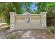 Stone Creek community entrance sign with decorative stone pillars and lush surroundings at 402 Bay Creek Dr, Charleston, SC 29414