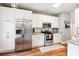 Modern kitchen featuring stainless steel appliances, white cabinetry, and granite countertops at 402 Bay Creek Dr, Charleston, SC 29414