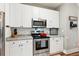 Well-lit kitchen with stainless steel appliances, ample cabinet space, and granite countertops at 402 Bay Creek Dr, Charleston, SC 29414