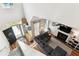 Open-concept living room with a cozy fireplace, hardwood flooring, and staircase at 402 Bay Creek Dr, Charleston, SC 29414