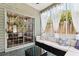 Inviting sunroom featuring modern furniture and a seamless indoor-outdoor transition at 402 Bay Creek Dr, Charleston, SC 29414