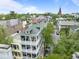 Aerial view of a charming multi-story home with inviting porches and a picturesque neighborhood at 41 Legare St # C, Charleston, SC 29401