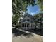 Charming multi-story home with a grand double veranda and classic architectural details surrounded by lush greenery at 41 Legare St # C, Charleston, SC 29401