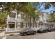 Exterior view of multi-story home featuring porches, shuttered windows, and well-maintained landscaping at 41 Legare St # C, Charleston, SC 29401