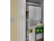 A compact, stacked washer and dryer setup with an energy guide label at 41 Legare St # C, Charleston, SC 29401